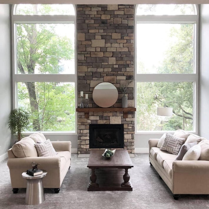 A living room with high ceilings.