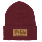 A red beanie hat with the winter warrior logo.