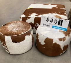 3 Cowhide ottomans