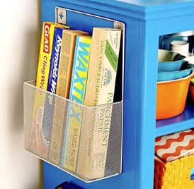 Storage basket on the side of a shelf.