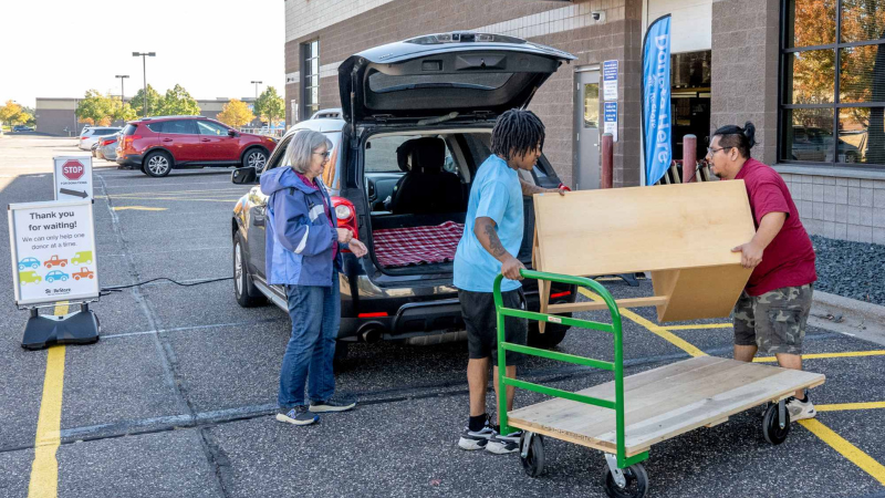 ReStore volunteers unloading a donation.