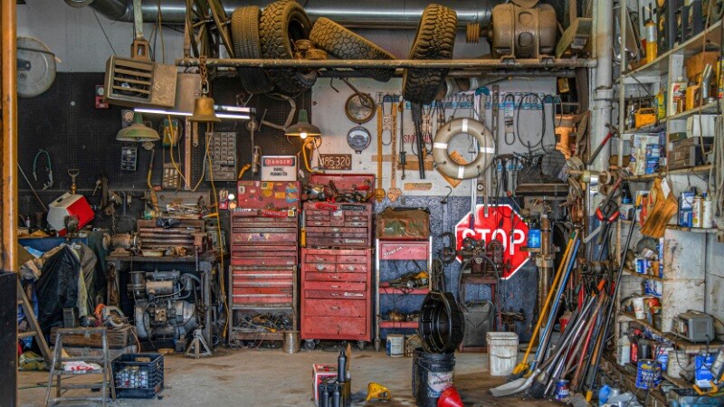Garage with many tools and mechanical items.
