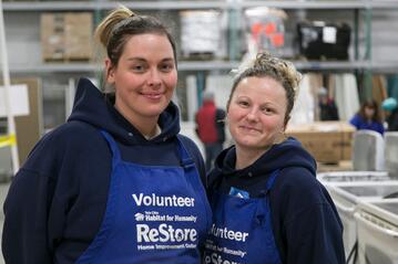Two ReStore volunteers.
