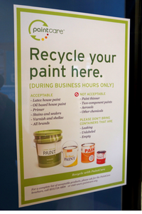 Sign saying "Recycle your paint here."