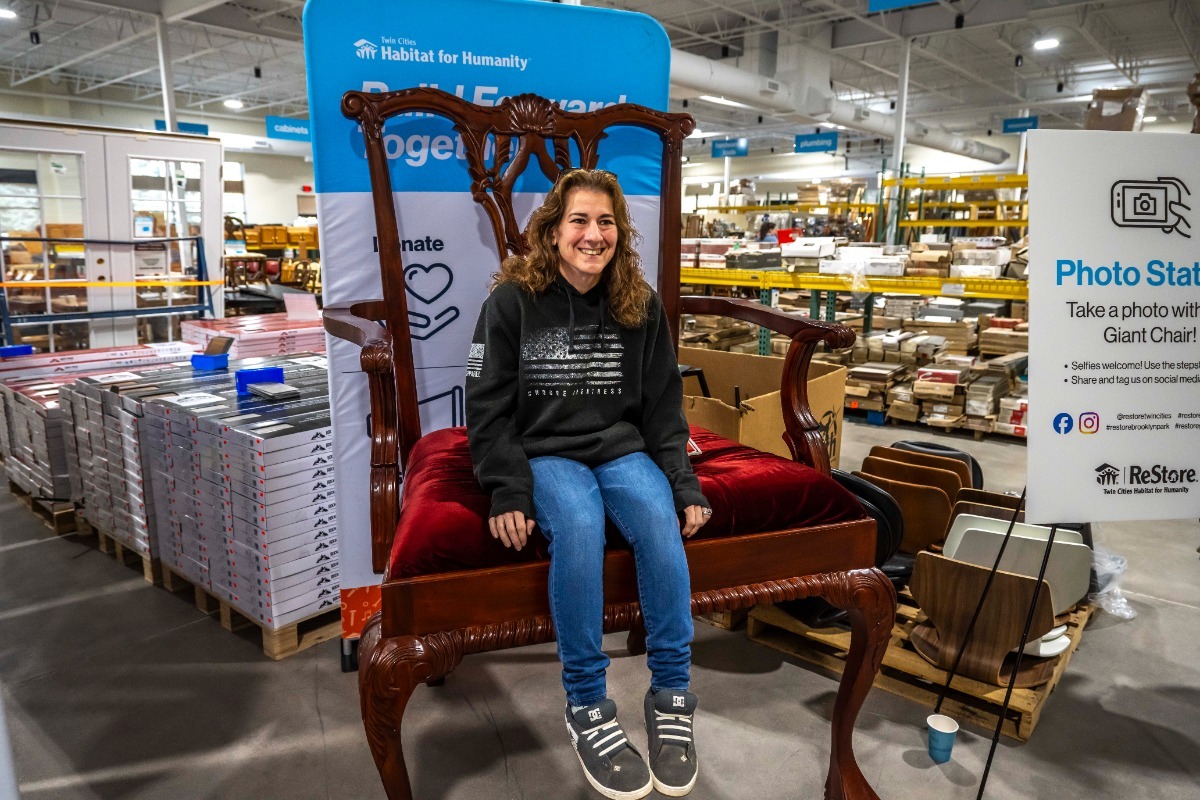 Shopper on the giant chair.