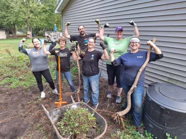 ReStore Roseville home group photo flexing