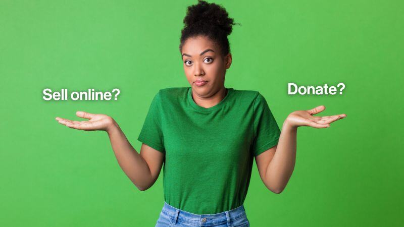Person in green shirt shrugging and deciding decide whether to sell online or donate.