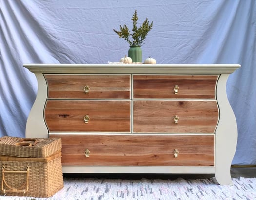 Upcycled dresser with white paint, sanded wood, and new brass handles