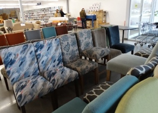 Blue and gray chairs donated by Kinfine.