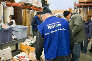 A volunteer at ReStore.