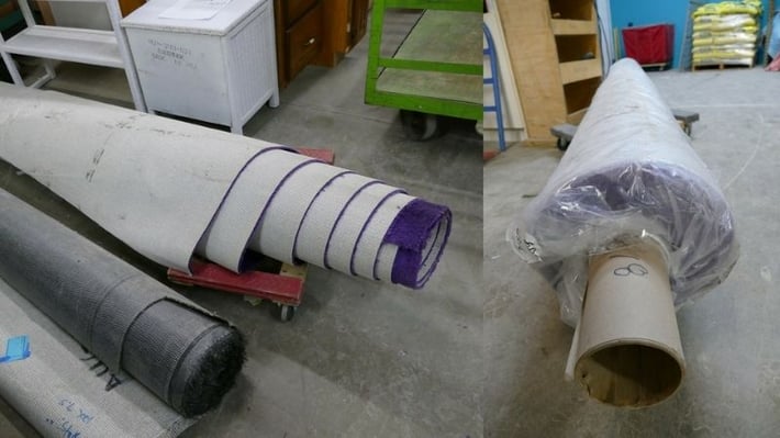 A roll of purple carpet.