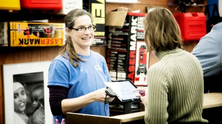 Jill at the check-out register.