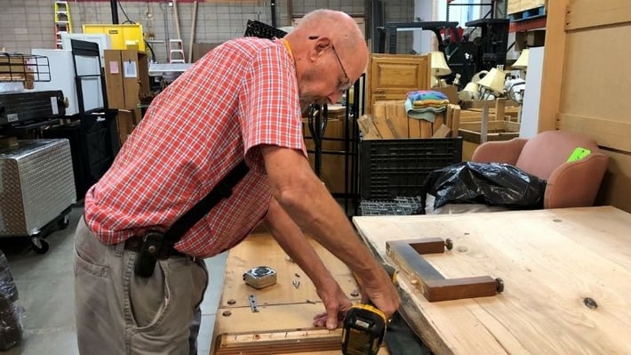 Calvin working on a carpentry project.