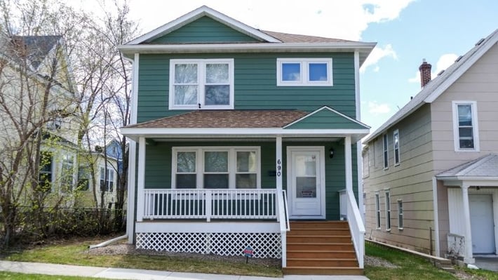 Green house on Sims Avenue.