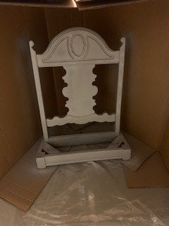 The chair back painted gray.