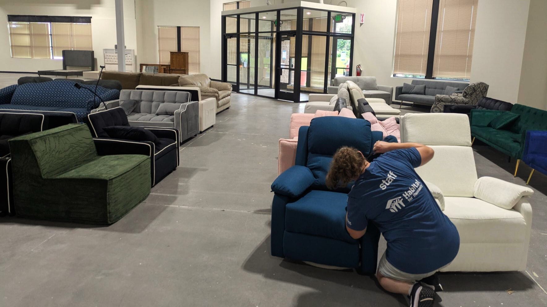 Volunteer working at ReStore.