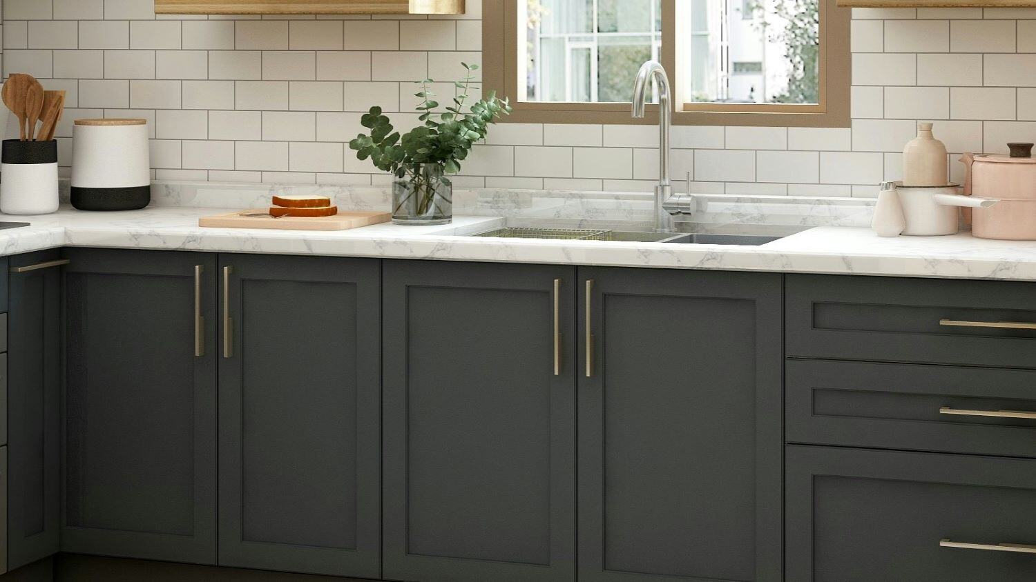 Kitchen with gold cabinet handles.