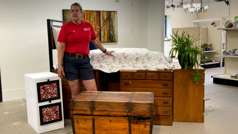 jan showing a bed on top of chest of drawers