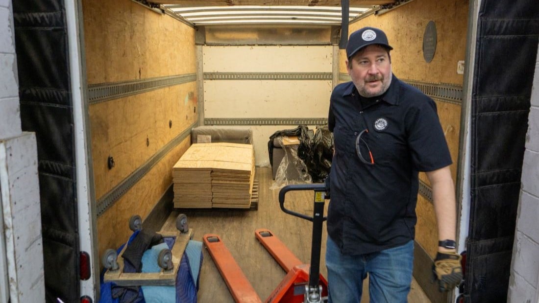 Slamhammer employee making a donation.