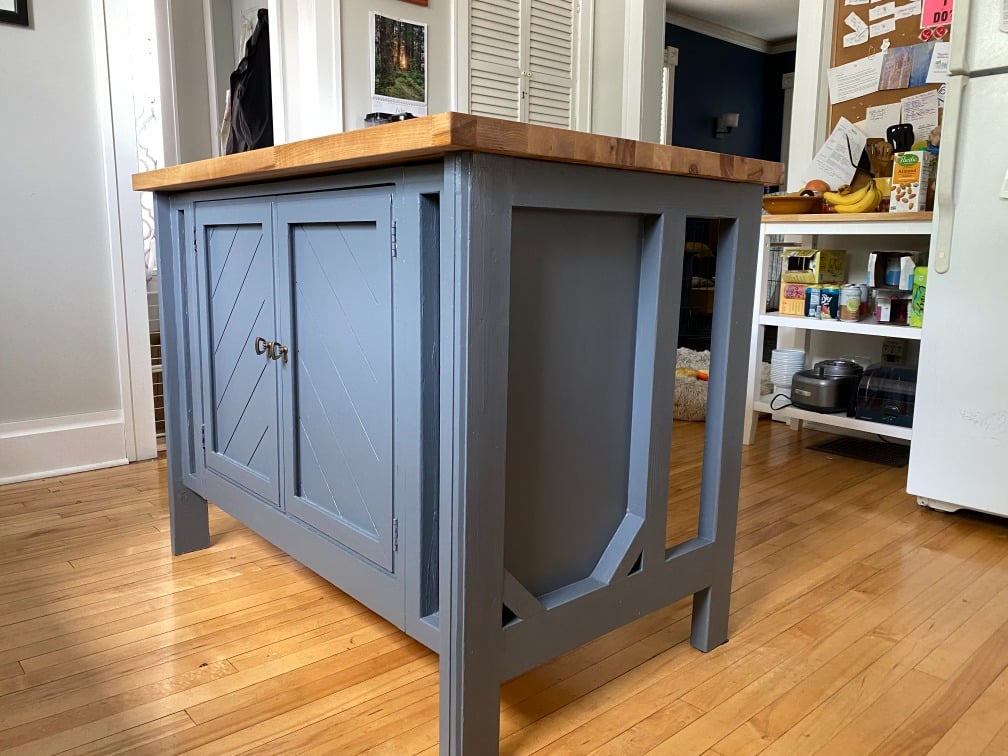 Blue kitchen island with cabinet