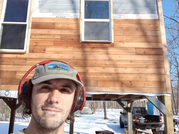 Derek on his construction site in winter