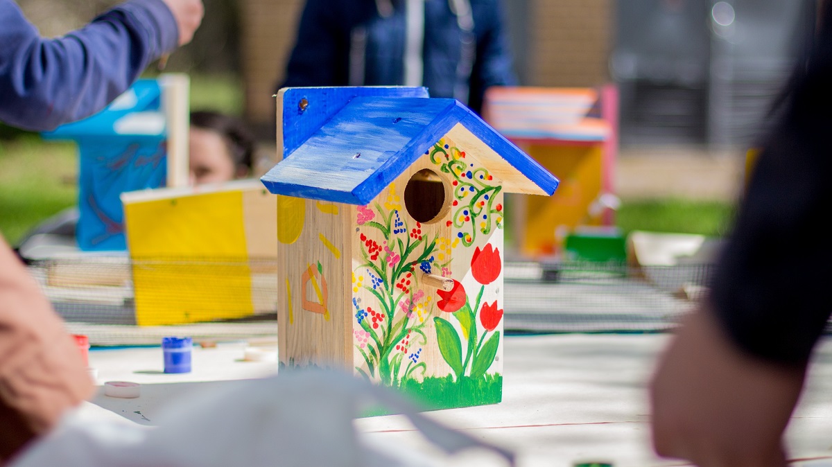 Colorful handmade birdhouse.